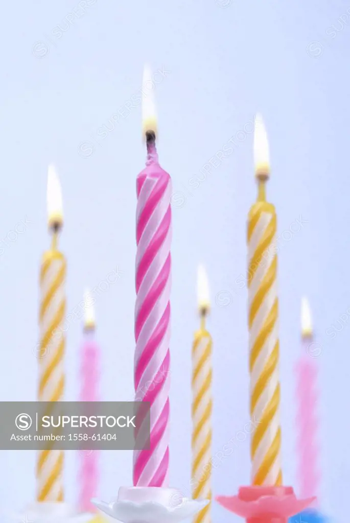 Birthday candles, colorfully, burning   Candlesticks, candles, wax candles, in two colors, pink-know, yellow-white, lights, candlelight, concept, part...