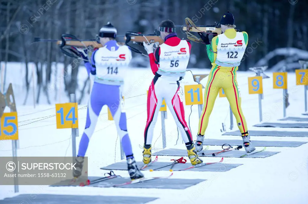 Biathlon, European Cup 5, shooting stand,  Athletes, stand, aims, view from behind  only editorially! Europe, Germany, Bavaria, Upper Bavaria, Kaltenb...