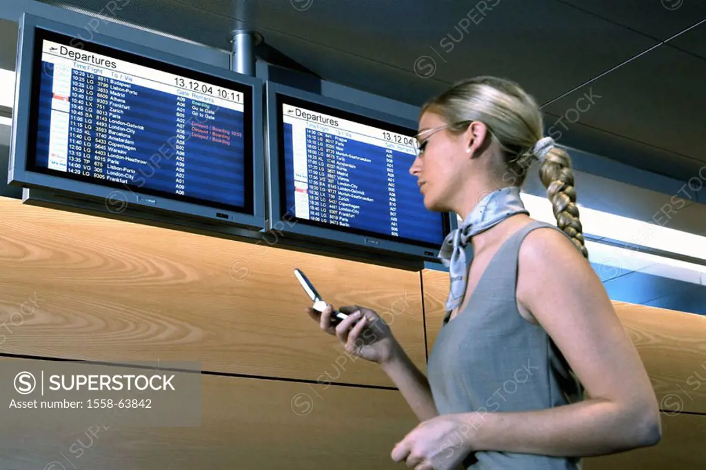 Telephones businesswoman, young, airport, cell phone, half portrait, on the side