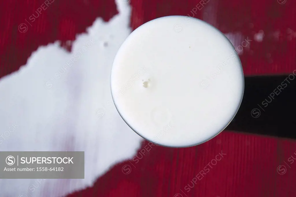Table, milk glass, fully, goes over, from above  Dining table, glass, tumbler, milk, pours out, overfull, filled, edge-fully, symbol, concept, misfort...