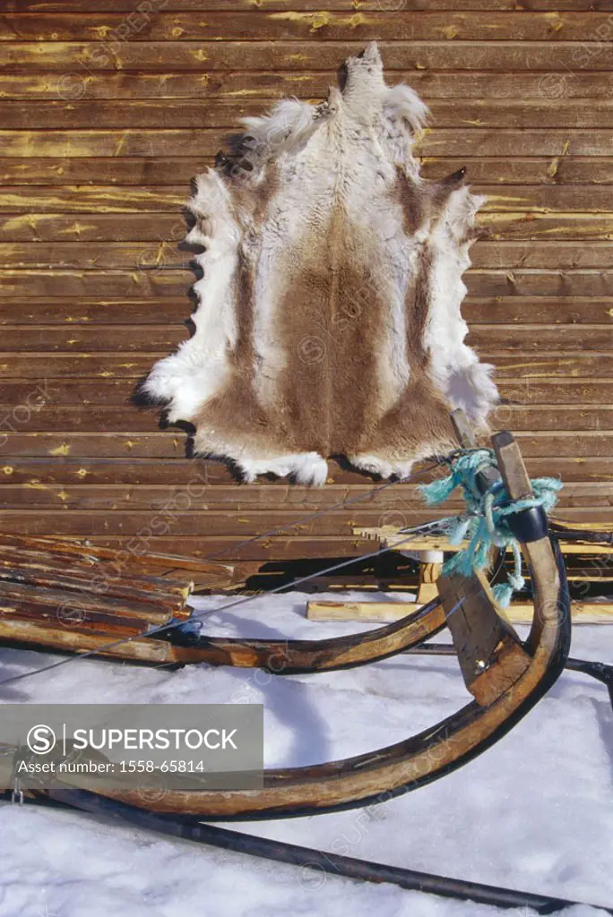 Norway, Finnmark, Kautokeino,  framehouse, reindeer fur, desiccation, Sleighs, detail, winters Scandinavia, north, cottage, wood cottage, facade, fur,...