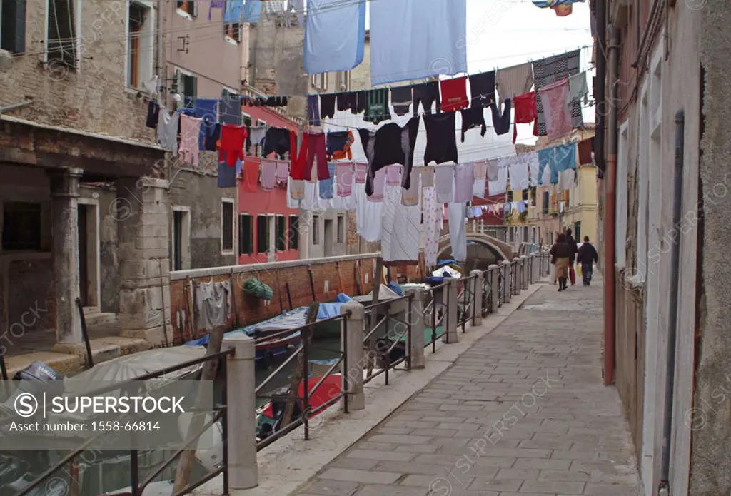 Italy, Venice, district Castello, Canal, row of housesn, clothes lines  Europe, Venetien, lagoon city, side street, alley, sidewalk, pedestrians, wate...