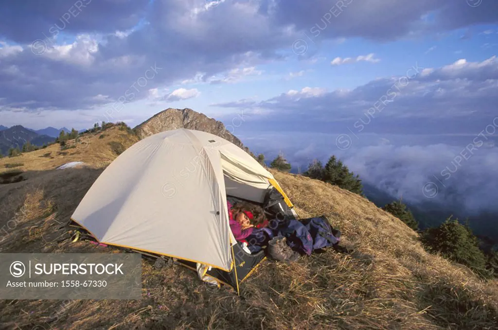 Germany, Bavaria, Ammergauer  Alps, ravine meadow comb, woman, tent,  sleeping Mountains, summits, outlook, morning light, dawn, clouds, meadow, mount...