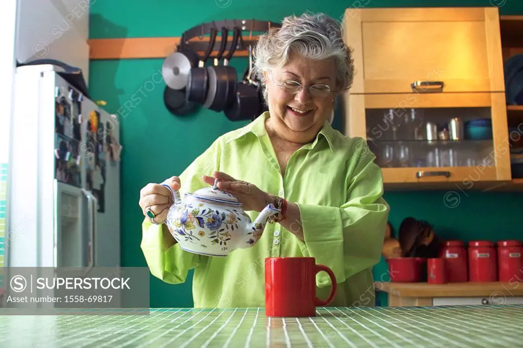 Kitchen, senior, tea-pot, cup,  Tea, pour out, smiling  Woman, 50-60 years, glasses, grey-haired, mug, teacup,  Beverage, pours, Teetrinken, contentme...