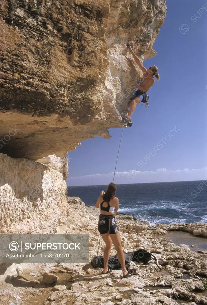 Sea, rock coast, overhang, Climbers, woman, secure  Coast, rocks, man, mountaineering, rope, mountain rope, protection, Team, Klettersport, sport, ext...