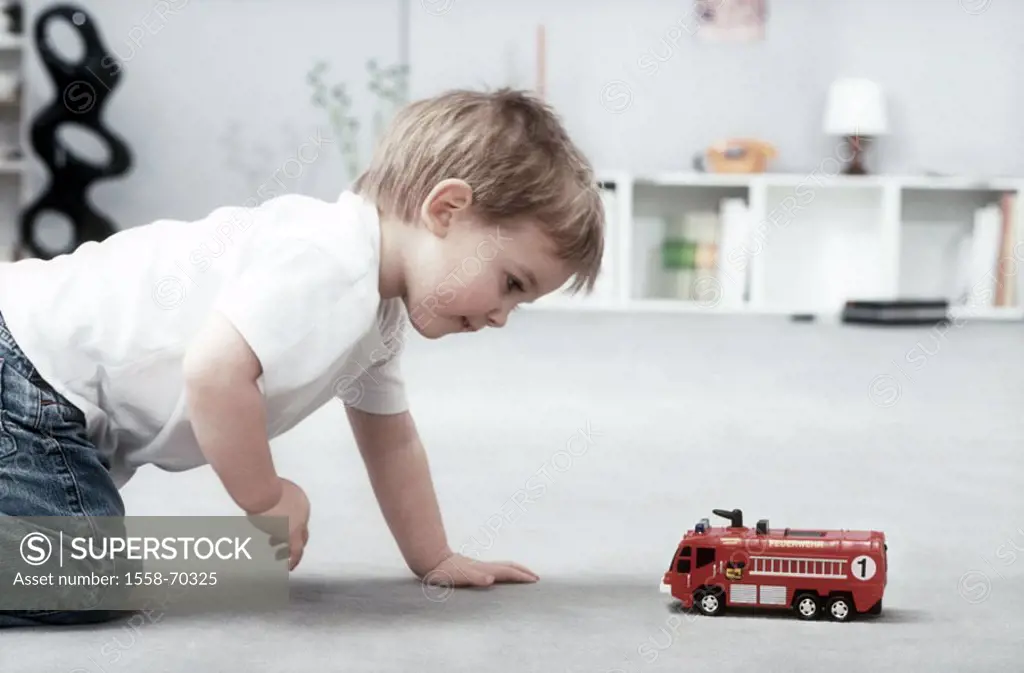 Floor, boy, toy, Fire engine, playing, detail  Living rooms, childhood, child, 3 years, model car, toy car, game, activity, , interest, Lernphase, dev...