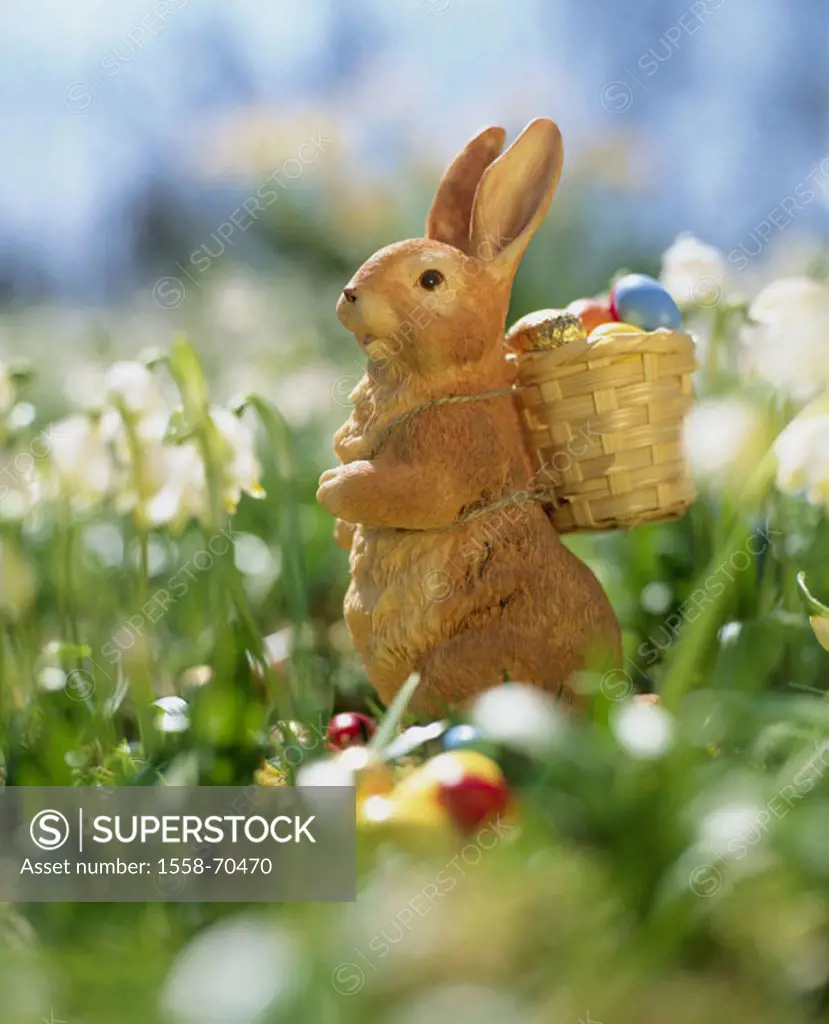 Easter, meadow, in the spring flowers,  Plastic Easter bunny, Osternest,   Easter, Eastertime, grass, Easter bunny, Easter traditions, traditions, tra...