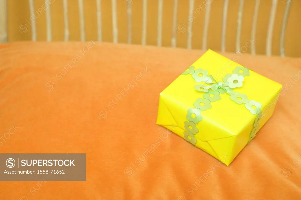 Pillows, detail, gift   Surprise, surprise gift, birthday, birthday gift, packet, yellow, bow, quietly life, color mood orange, concept, joy