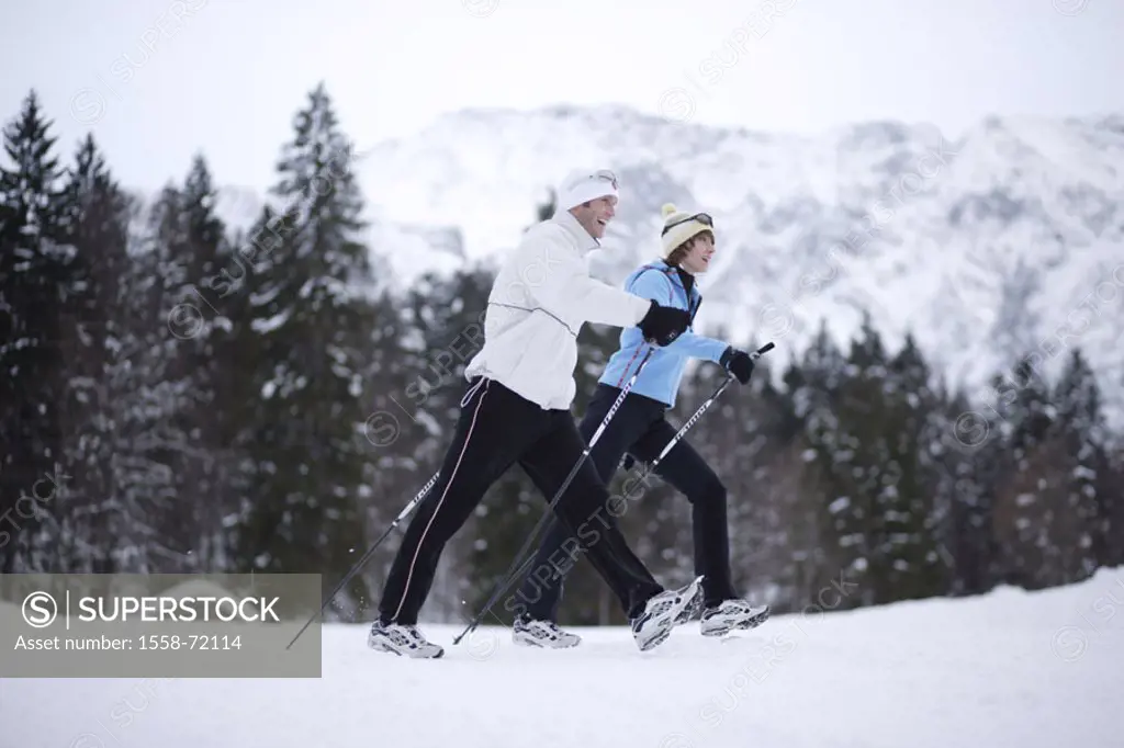 couple, Nordic Walking, on the side, snow   Athletes, 20-30 years, young, cap, gloves, sport, movement, activity, leisure time, health, recuperation, ...