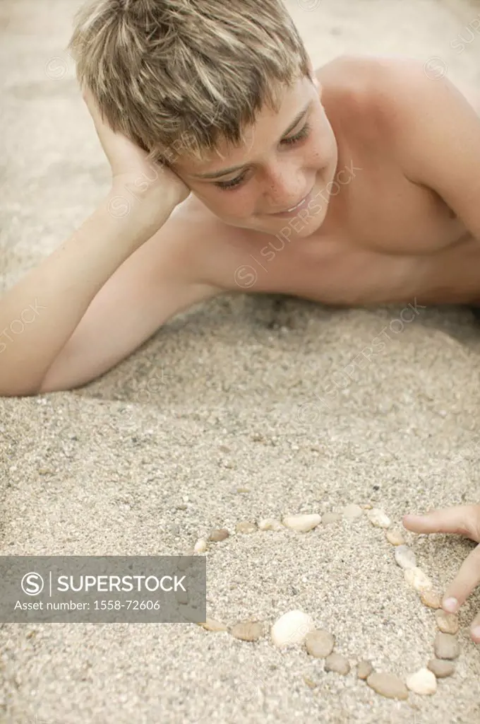 boy, upper bodies freely, sandy beach, lie, stones, heart, detail, mold  14 years, child, teenagers, symbol, falls in love, lovesickness, ´first big l...