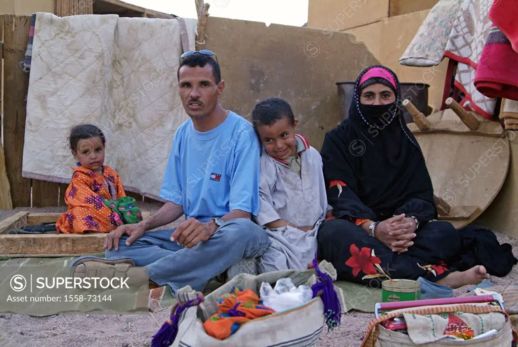 Egypt, Arabic desert, Bedouins, Family picture Africa, with Hurghada, desert inhabitants, desert people shepherd nomads parents children toddlers, smi...