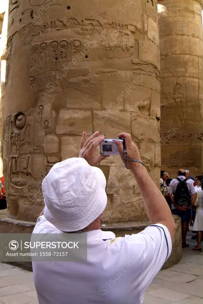 Egypt, Luxor, Karnak, Amun-Tempel,  Columns, tourist, Digitalkamera,  photographs, view from behind Africa, head Egypt, sight, destination, temple ins...