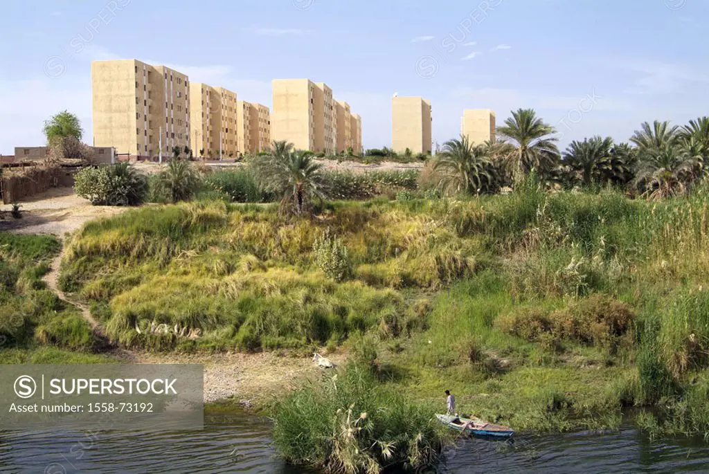 Egypt, Kom Ombo, view at the city,  Blocks of flats, river Nile man boat  Africa, head Egypt, city, skyscrapers, multiple-family dwellings, developmen...