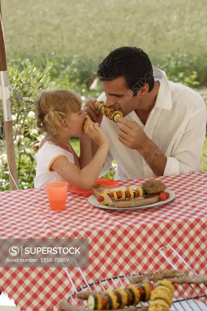 Father, daughter, garden, crickets,  Vegetable skewer, cobs, meal  Man, single, child, girls, table, sitting, garden grill, grill, charcoal grill, gri...