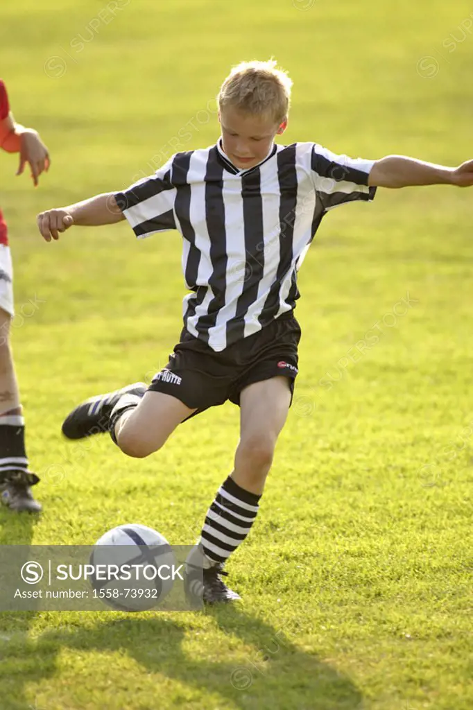 boy, soccer game    Child, childhood, youth, 8-12 years, leisure time, hobby, game, soccer players, game field, sport, sport, athletically, football b...