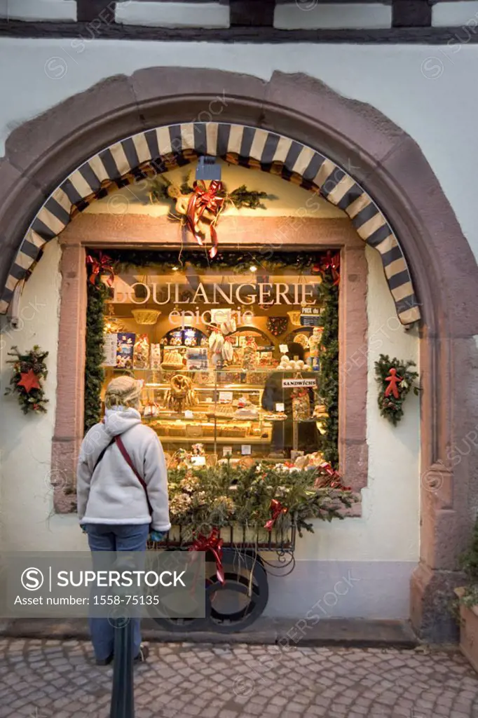 France, Alsace, Kaysersberg, bakery,  Display windows, Weihnachtsdekoration,  Woman, view from behind, Europe, Alsatian wine street, city, Boulangerie...