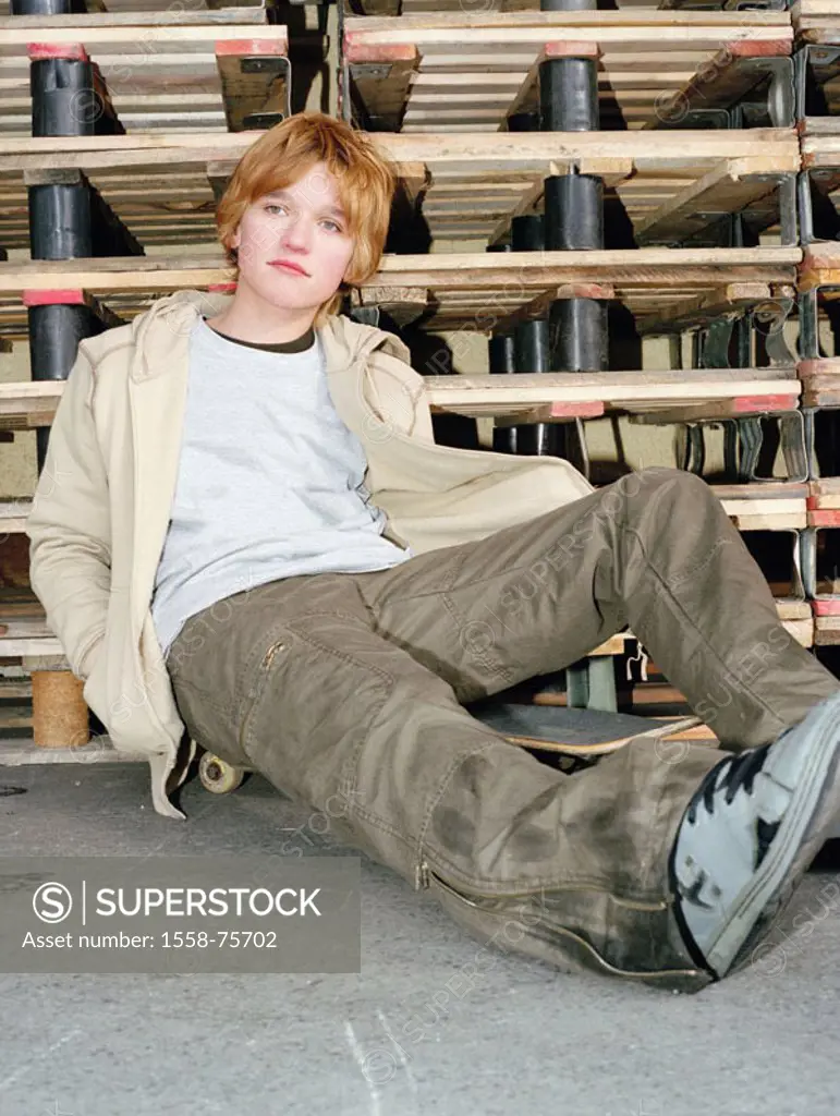 Teenager, skateboard, sitting,  Palette stack, leans  boy, youth, teenagers, 13-15 years, dreamy, gaze on the side, seriously, clothing, cool, nonchal...