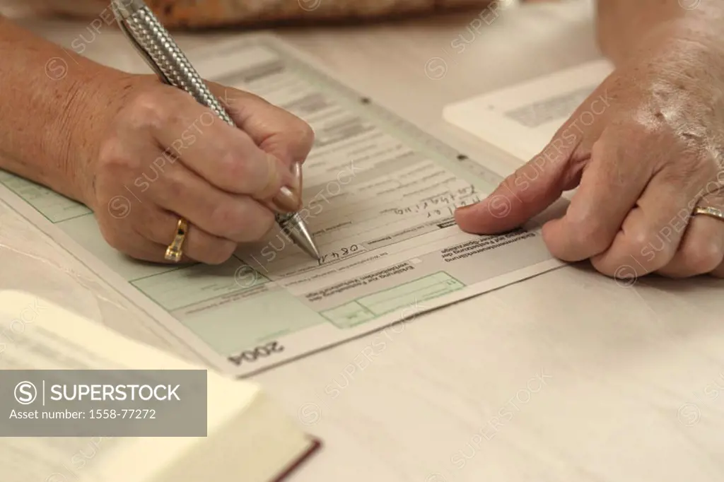 Woman, senior, tax return, fills,  Detail, hands, pen   Seniors, pension, taxes, taxable, tax form, form, withholding tax, federal income tax, taxes, ...
