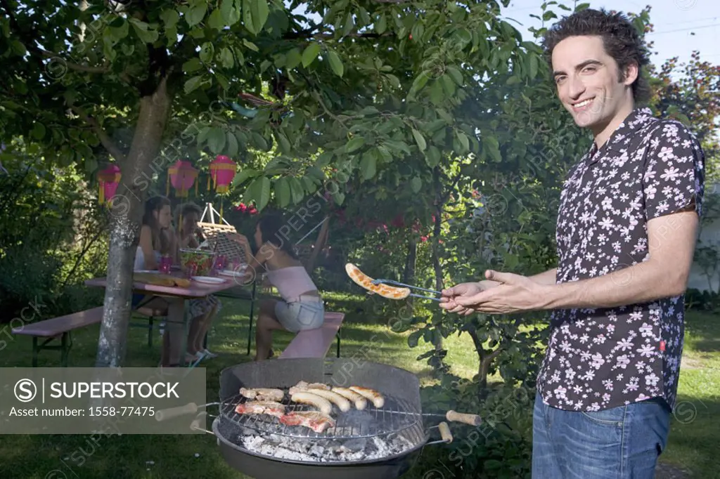Garden, grill, man, smiling, sausage,  offers  28 years, 20-30 years, summer, leisure time, weekend, closing time, barbecue, garden party, summer part...