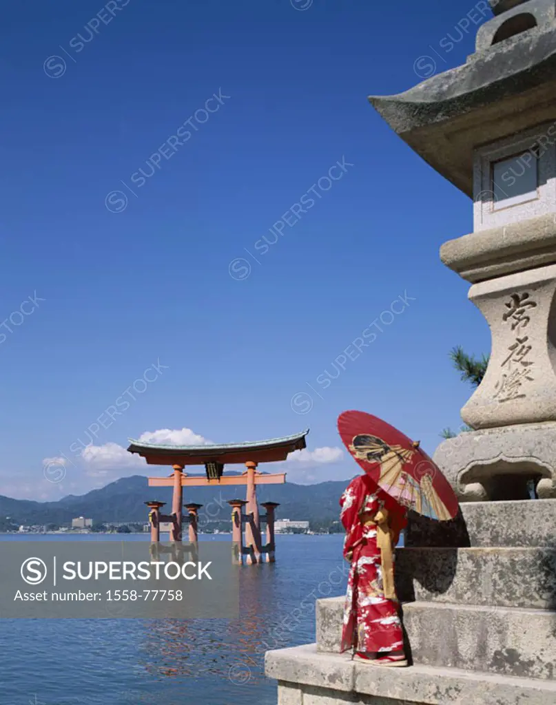 Japan, island Honshu, Miyajima,  Itsukushima Shrine, Torii, beach, Pedestals, Japanese, Sari, parasol, view from behind Asia, bay, Itsukushima shrine,...