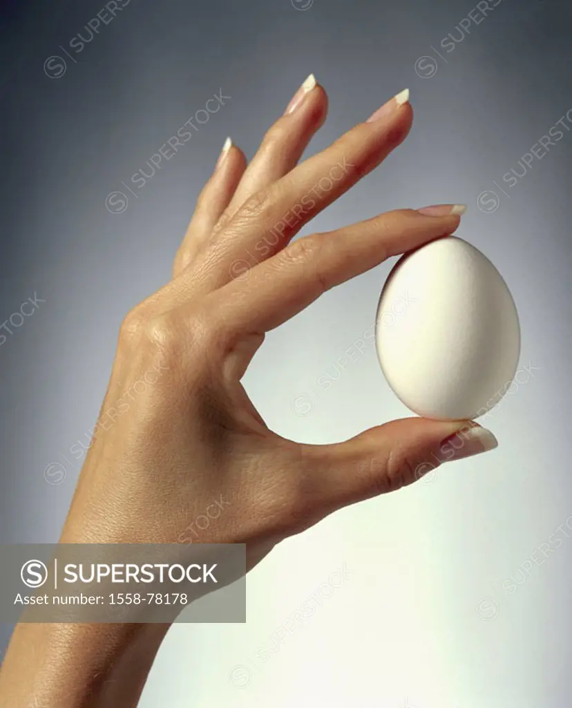 Women hand, hen´s egg, holding   Woman, detail, hand, fingers, index fingers, thumbs, egg, cautiously, careful, fragile, sensitively, shows, guards, o...