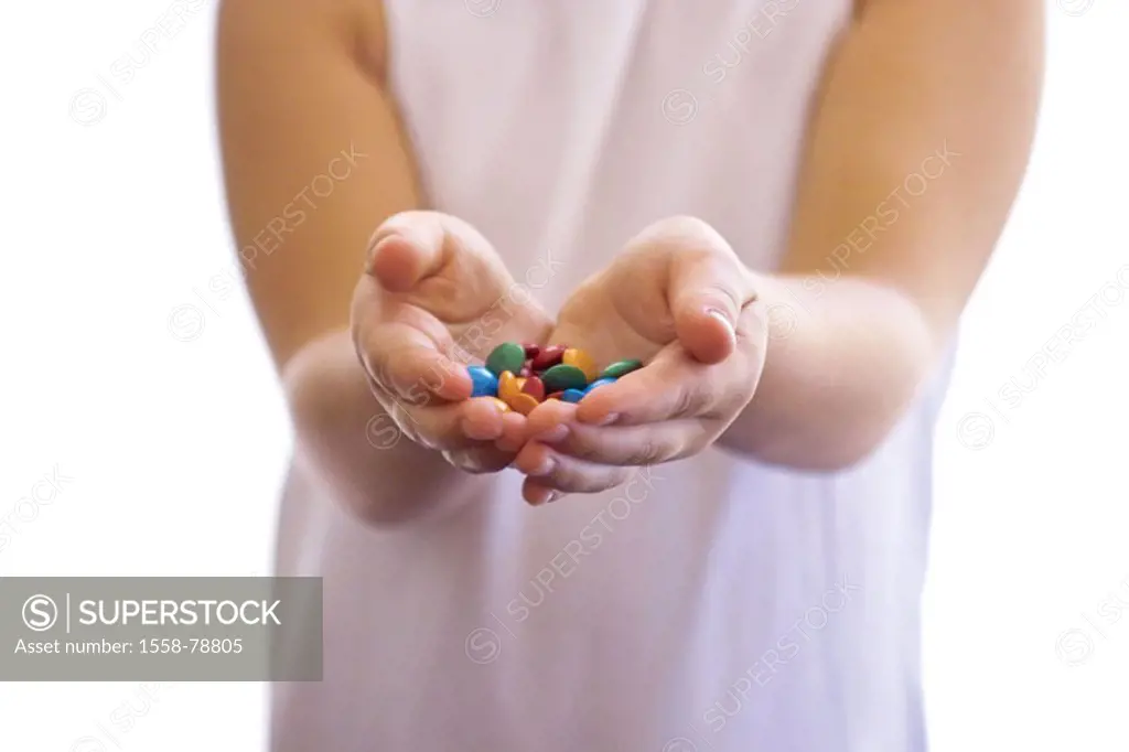 Girls, hands, candies,  holding, shows, detail   Child, 5-6 years, palms, candies, Schokolinsen, Smarties, nutrition, unhealthily, dye saccharated cal...