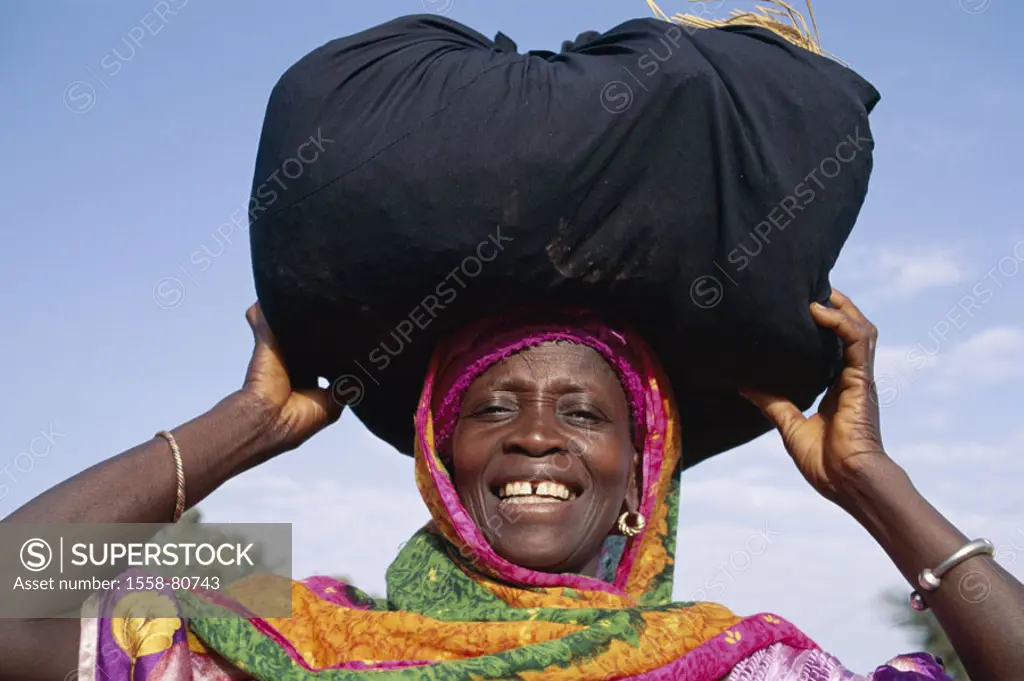 Gambia, Banjul, woman, people of color, smiling,  Head, cloth, straw, carries, portrait  Africa, west Africa, women portrait, African, natives, skin c...