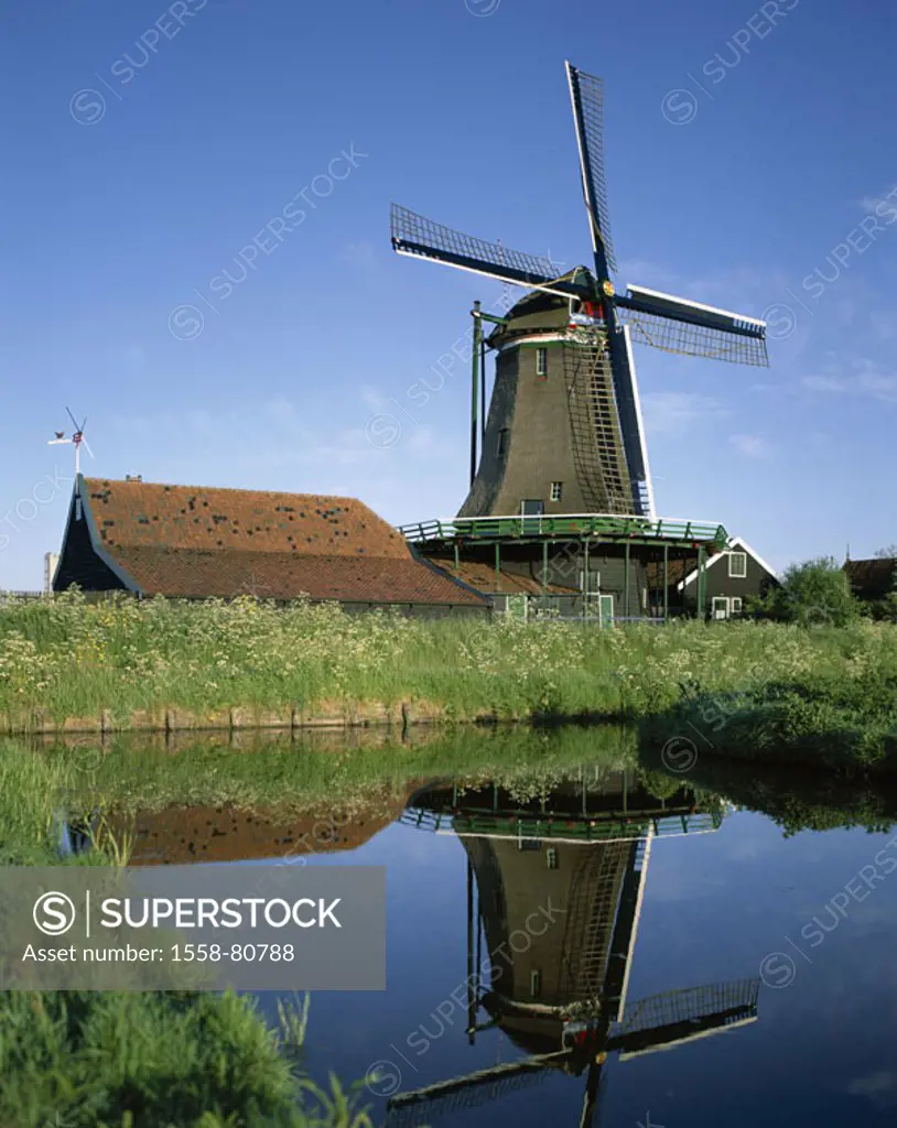 Netherlands, Holland, Zaanse Schans,  Museum village, close to Amsterdam,  Windmill, pond, reflection  Sight, destination, vacation, trip, leisure tim...