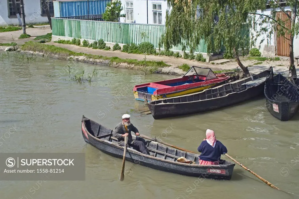 Ukraine, Vilkovo, water canal, shores, Rowboats, senior couple, Europe, Eastern Europe, Danube delta, canal, creek, artificially, water river settleme...