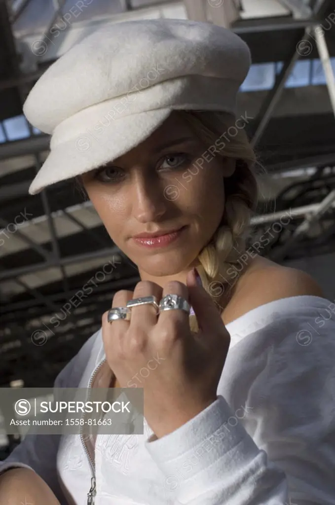 Hall, woman, young, blond, braid, cap,  Silver jewelry, hand, rings, gesture,  Look camera, portrait,  Series, warehouse, parking structure, 20-30 yea...