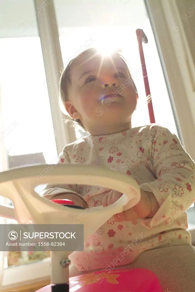 sitting toy car, girls,  Back light  Child, toddler, 1-2 years, indoors, at home, playing, game, fun, childhood, car, Bobbycar, steers, development ph...