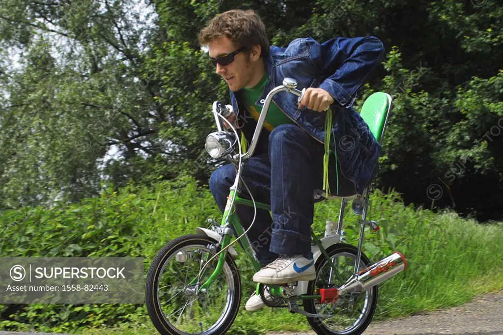 Man, young, child bicycle, drives    20-30 years, sun glass, jeans, jeans jacket, nostalgia bicycle, Bonanzafahrrad, Bonanza-Fahrrad, wheel, bicycle, ...
