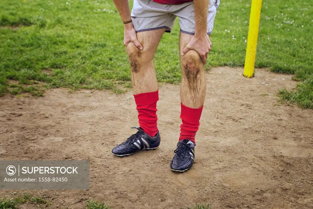 Soccer ground, goal-keeper, detail, legs,  Knees, dirty, scraped  Soccer players, players, man, 20-30 years, clothing, football clothing, football, so...