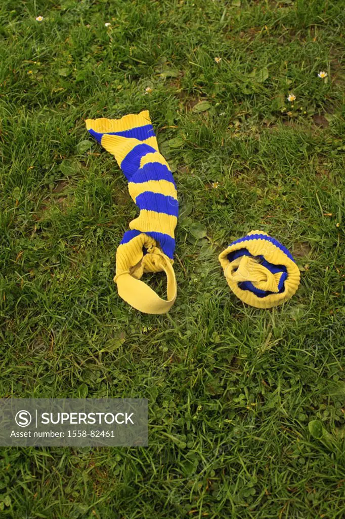 Soccer ground, meadow, stockings, lies   Stockings, stopping short, ringlet socks, ringlet stockings, curled, roved, yellow-blue, football clothing, m...