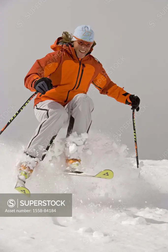 Woman, skiing, deep snow, Schneekuppe,  Jump   Sport, winters, winter sport, skier, ski, ski poles, winter clothing, Skikleidung, cap, glasses, anorak...