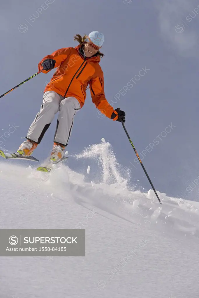 Woman, skiing, deep snow, Schneekuppe,  Jump   Sport, winters, winter sport, skier, ski, Carvingski, ski poles, winter clothing, Skikleidung, cap, gla...