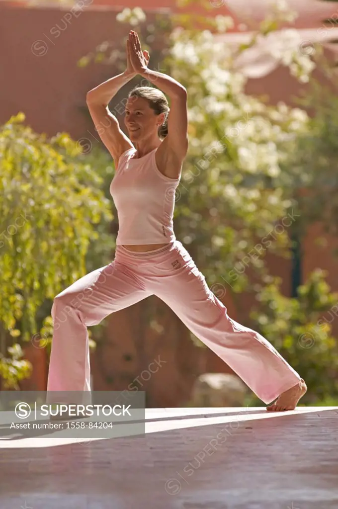 Woman, Yogaübung, summer, outside     Terrace, garden, light, shadows, gymnastics, Yoga, practice, Yogaposition, ´the tree´, cancellation step, balanc...