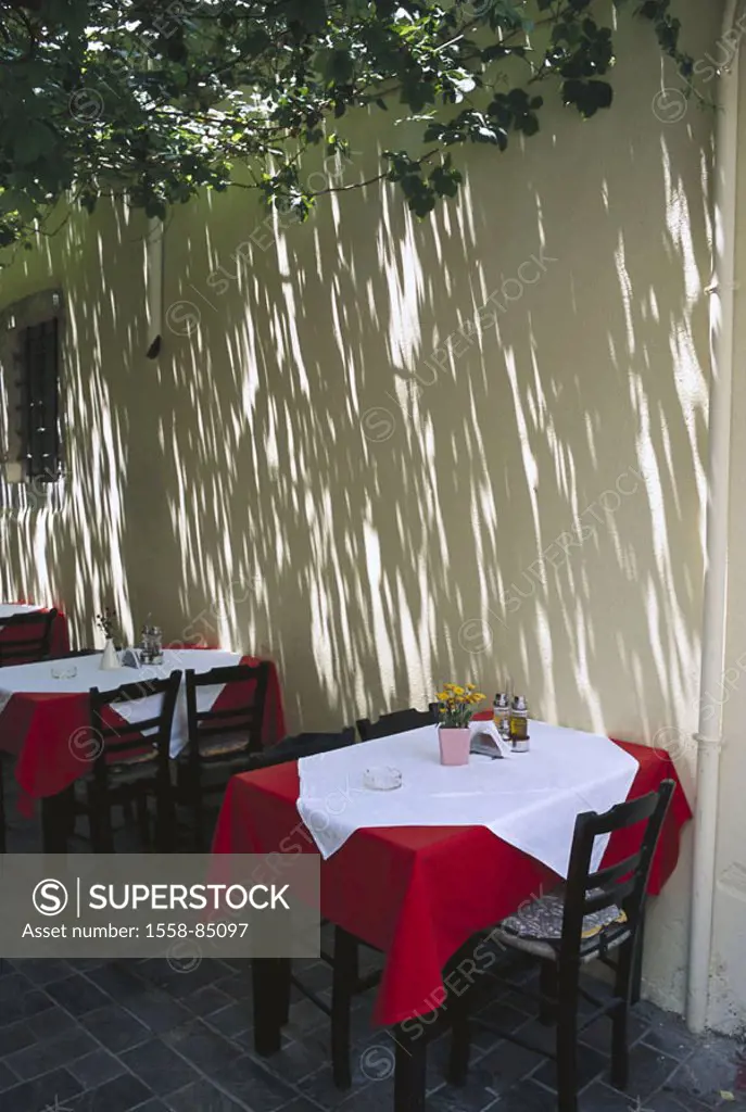 Greece, island Crete, Rethymnon,  Restaurant terrace, tables, chairs,  Wall, light, shadows,  Europe, Mediterranean island, destination, hospitality, ...