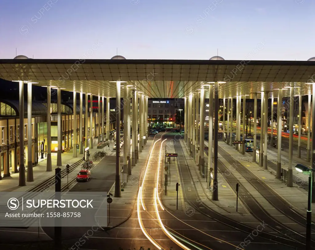 Germany, Hesse, Kassel,  Railway station forecourt, Busbahnhof,  Light tracks, evening,  Europe, city, railway station, forecourt, stop, roofs, column...