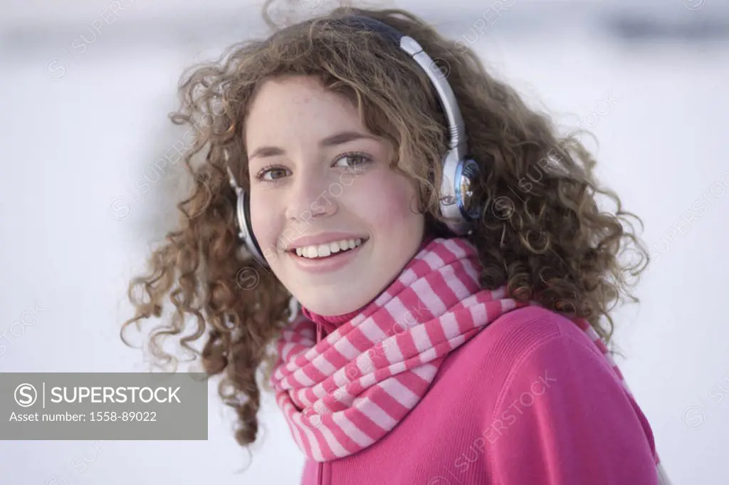 Woman, young, headphones, laughing, portrait,  Winters,   Series, 16-18 years, teenagers, teenagers, girls, long-haired, curls, sweaters pink, scarf, ...