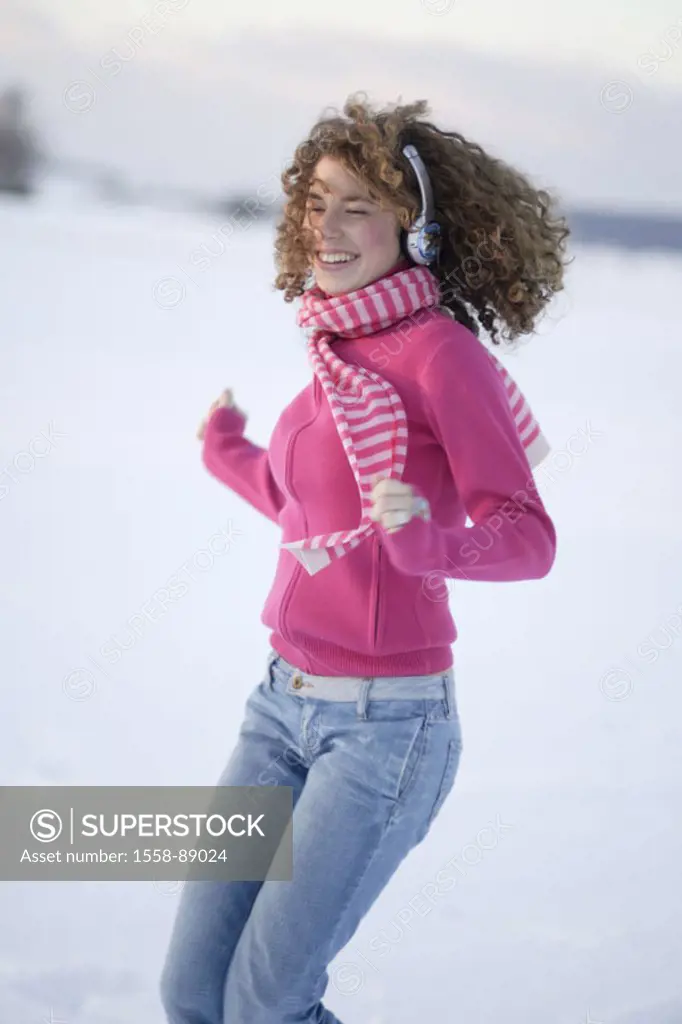 Woman, young, headphones, laughing, dances, Detail, winters,   Series, 16-18 years, teenagers, teenagers, girls, long-haired, curls, sweaters pink, sc...