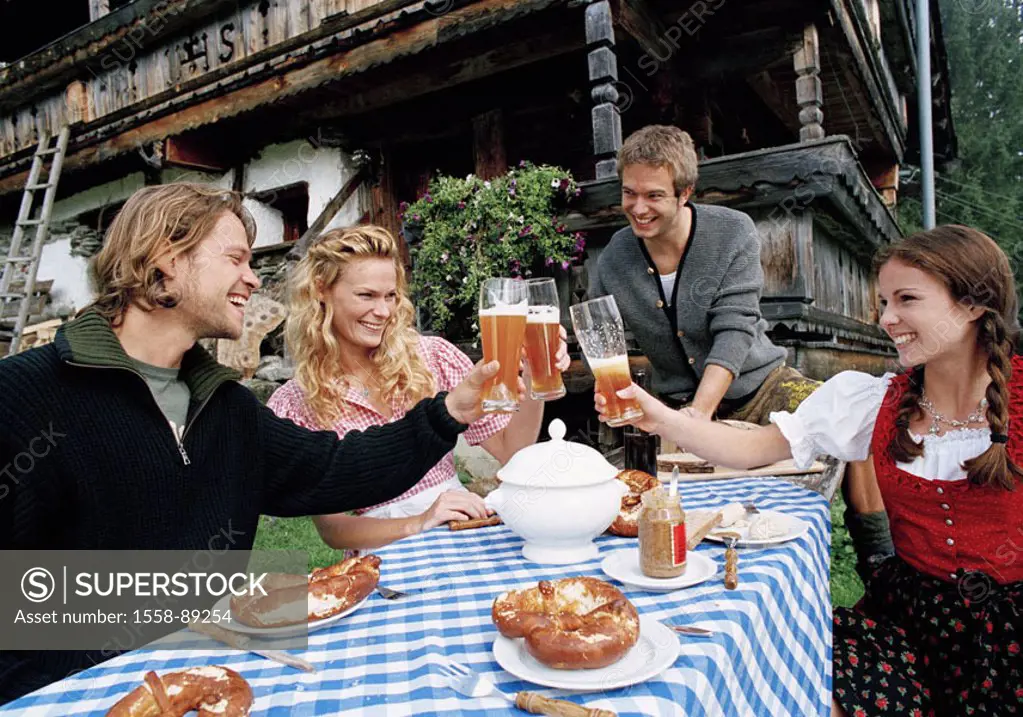 Men, women, young, Almhütte, outside,  Benches, table, bread time, beer, happy,   Series, 20-30 years, pair, friends, clothing, Dirndl, official dress...
