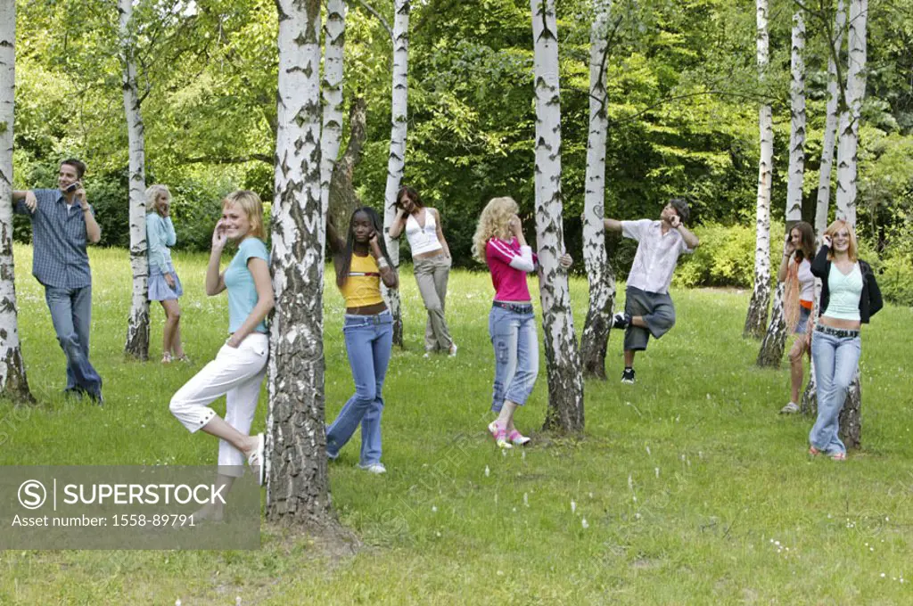 Park, trees, teenagers, Cell phones, telephones,   Park, women, men, young, students, telephones, telecommunication, cell phone addiction, cell phone ...
