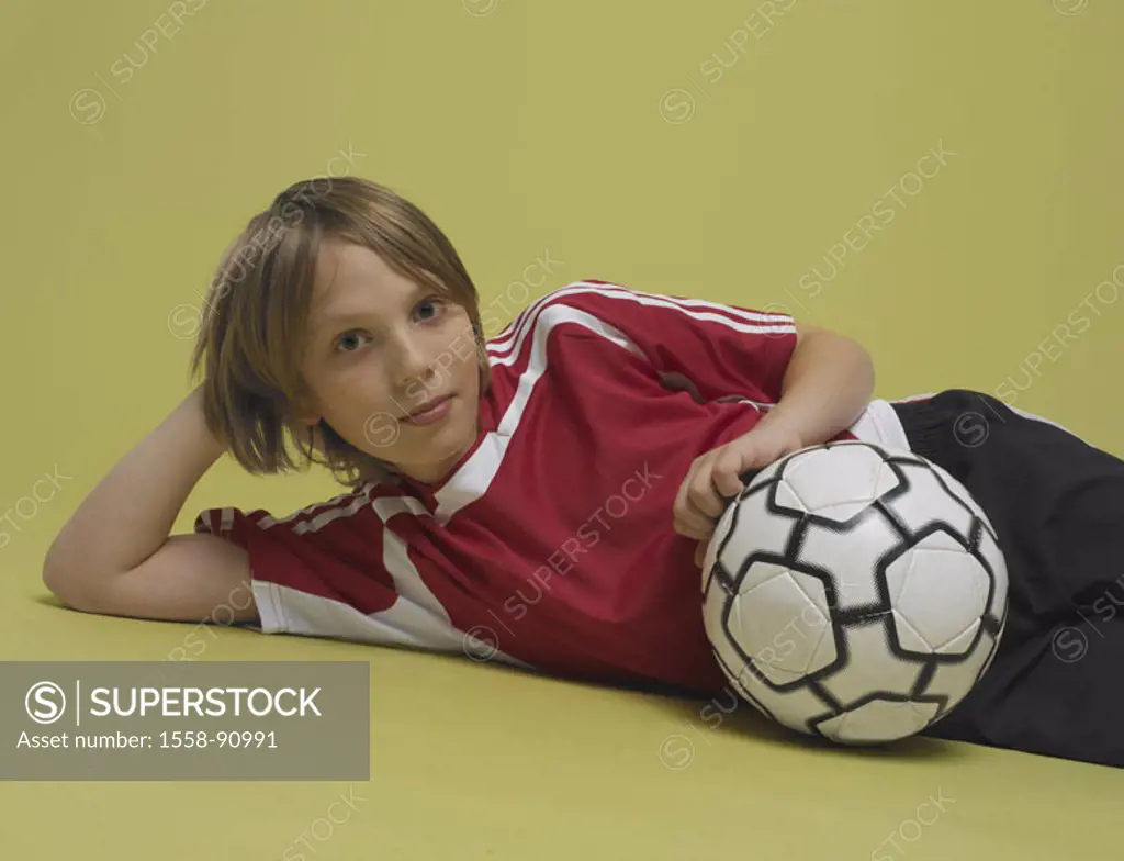 boy, floor, lie, football,  holding, on the side, detail,   Series, 8-12 years, child, soccer players, sportswear, jersey, ball, pause, exhaustion, re...
