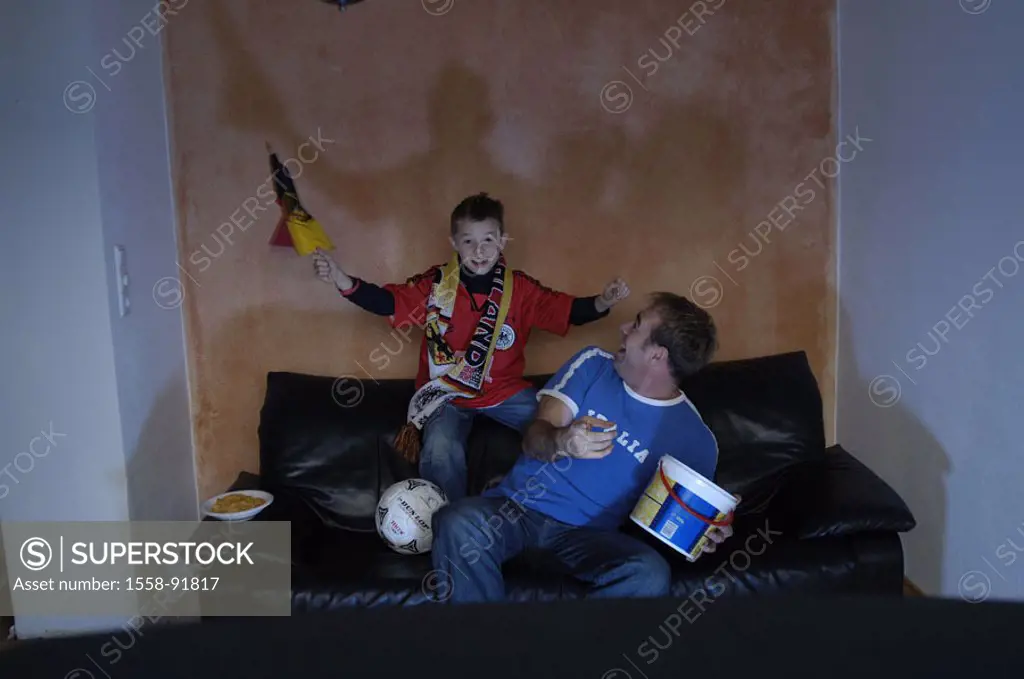 Father, son, living rooms, television,  Football fans, joy, jubilation, gate,   Series, parent, child, boy, flag, pennants, scarf, Fanschal, Germany f...