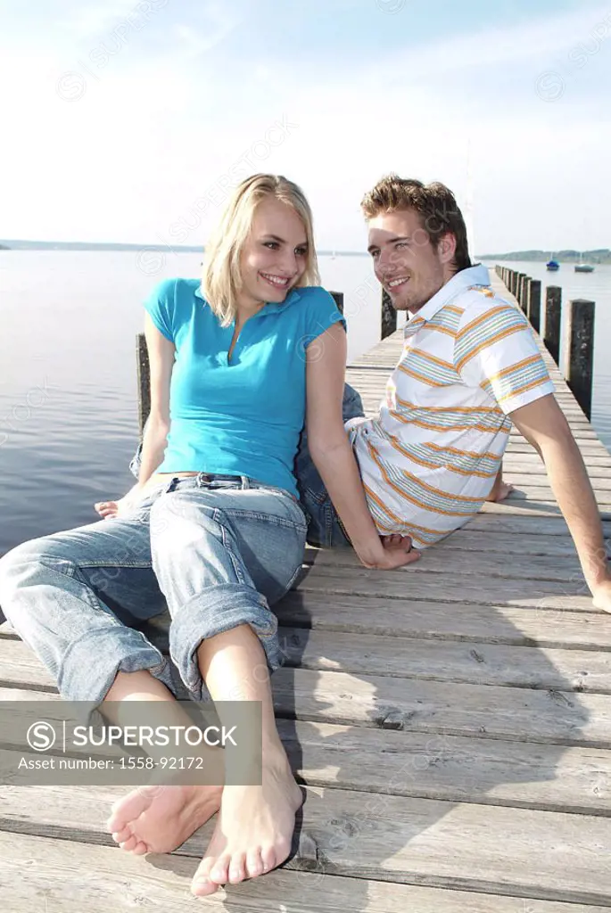 couple, young, falls in love, sea, boat bridge, sitting,    Series, 20-30 years, love, partnership, relationship, happily, cheerfully, smiling, jeans,...