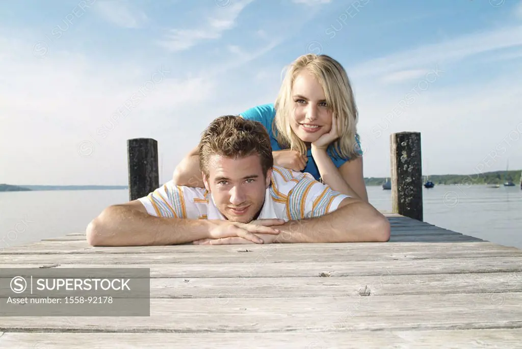 couple, young, happily, sea, Bootssteg,  lie, one on top of the other,   Series, 20-30 years, love, partnership, relationship, falls in love cheerfull...