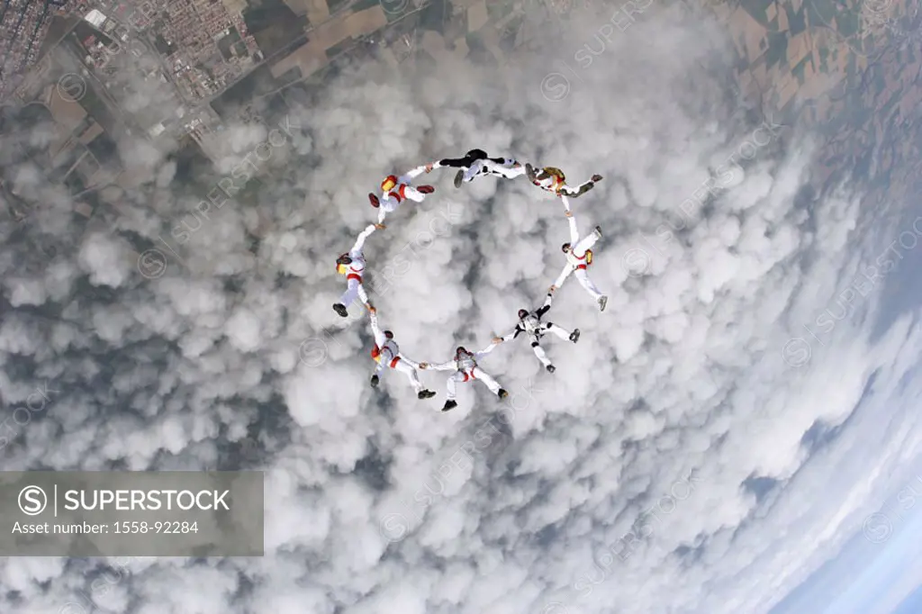 Skydiver, suitors case formation headlong,  Hands, circle, hold from above,   Parachutists, 8 people, athletes, extreme athletes, sport, extreme sport...