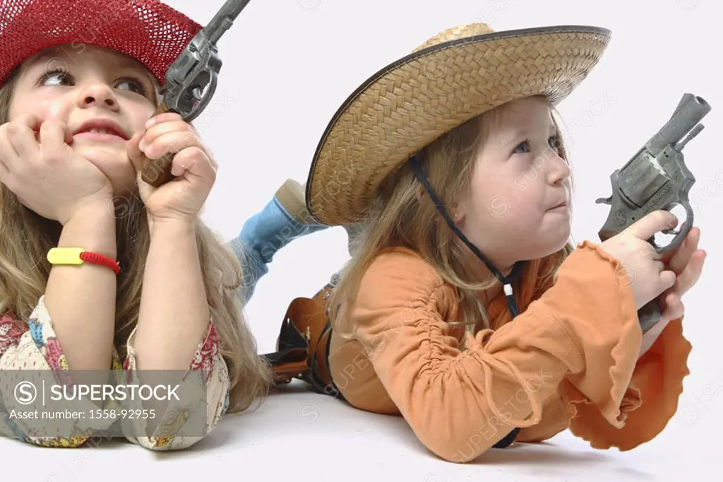 Girls, disguise, Cowgirls,  Gesture, pistols, floor, lies,  Portrait, broached,  Series, children, friends, sisters, two, 6-10 years, long-haired, hea...