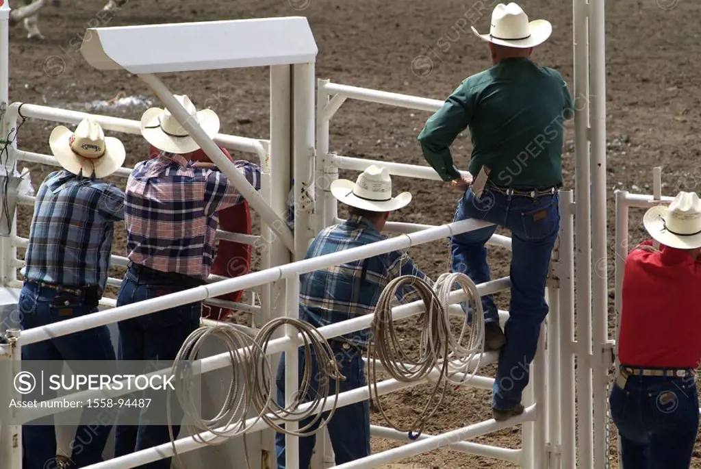Canada, Alberta, Calgary, Stampede, rodeo, cowboys, view from behind,